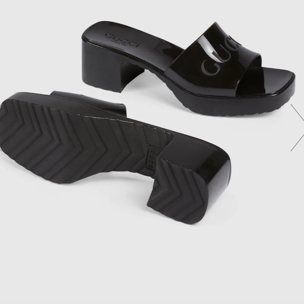 Gucci 41 rubber mid heels in the color black.